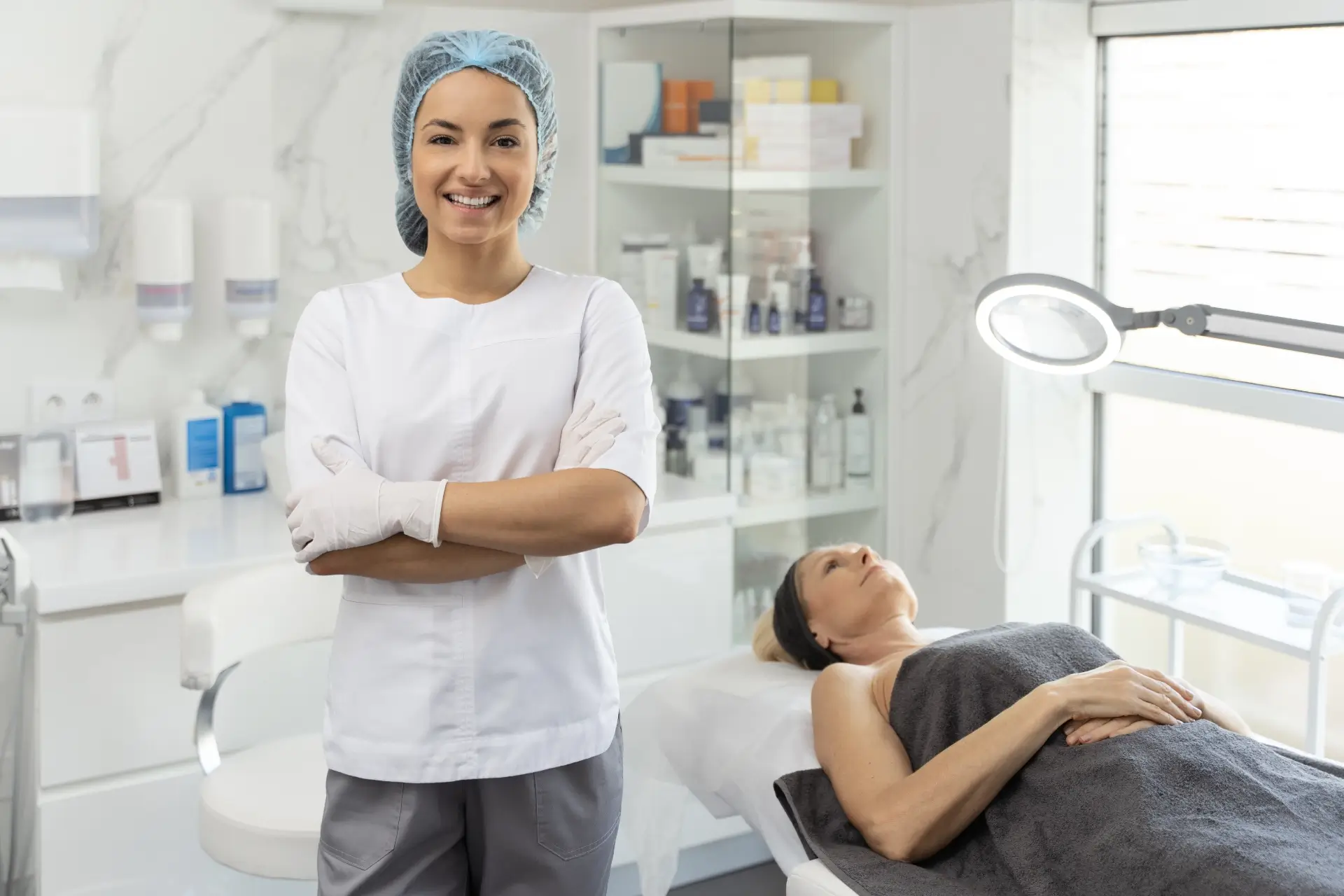 A certified practitioner in a clean, modern Winnipeg skin clinic