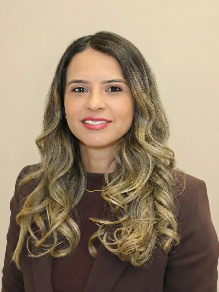 Priscila Ferreira, Certified SharpLight Practitioner at Flawless Derma Centre in Winnipeg